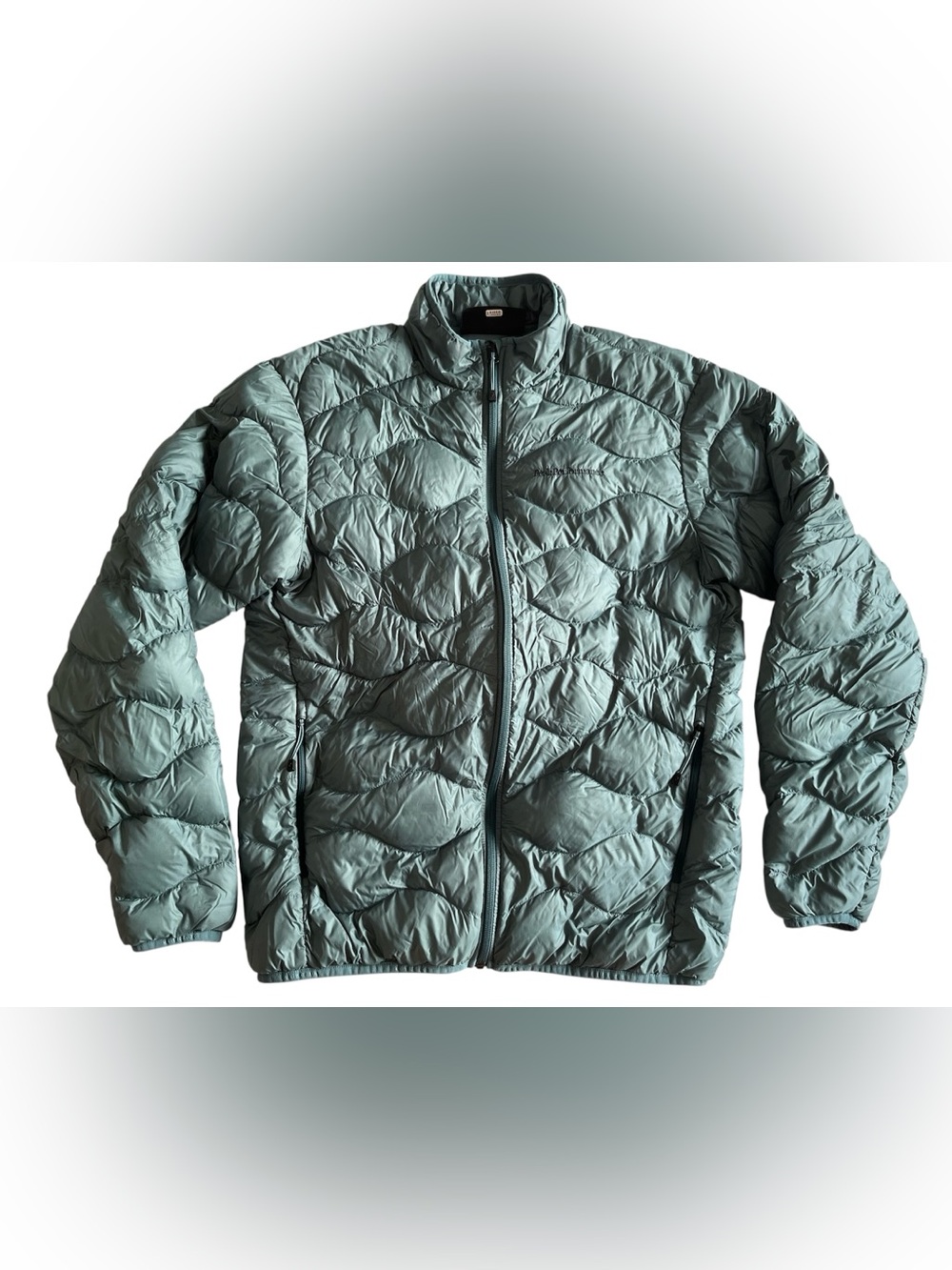 Peak Performance Quilted Puffer Jacket in teal